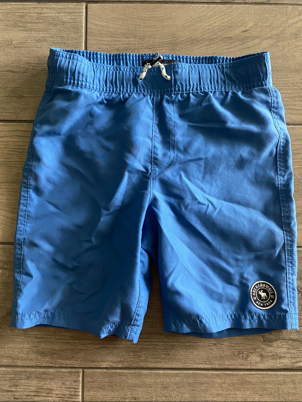Abercrombie Kids Boys Color Changing Swim Trunks - Blue to Skull Pirate Graphic